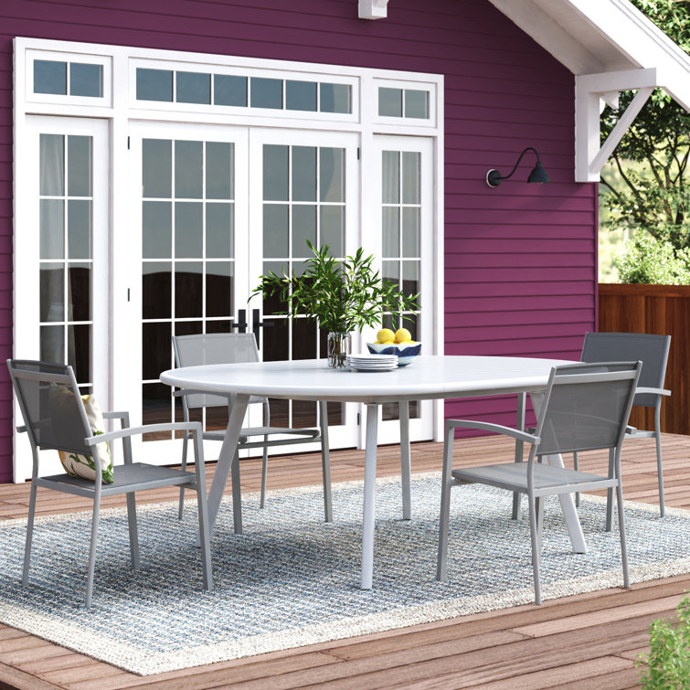 Corrigan Studio® Mikole 4 Person Oval Extendable Outdoor Dining Set